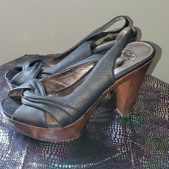 Shoes - Flirty black and brown peep toe heels